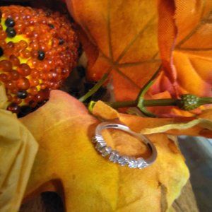 Very unique 10k white gold and diamond ring